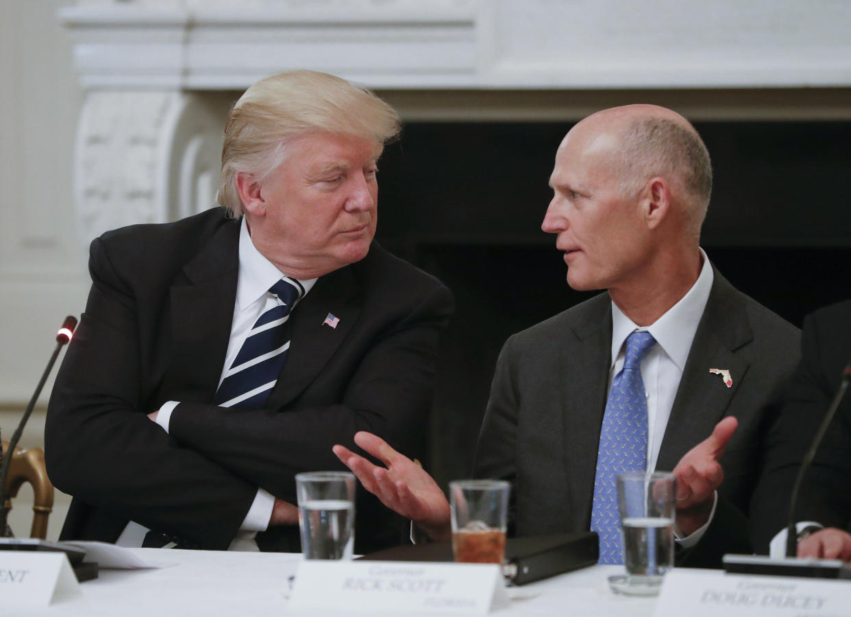 <span class="s1">President Trump and Florida Gov. Rick Scott at an Infrastructure Summit at the White House in 2017. (Photo: Pablo Martinez Monsivais/AP)</span>