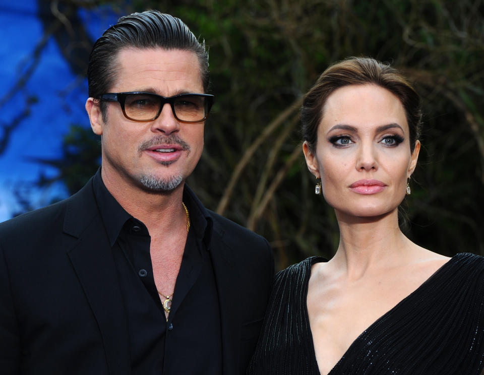 Brad Pitt y Angelina Jolie en mayo del 2014 en Inglaterra.  (Photo by Anthony Harvey/Getty Images)