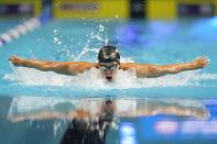 Hali Flickinger participates in the women's 200 butterfly during wave 2 of the U.S. Olympic Swim Trials on Thursday, June 17, 2021, in Omaha, Neb. (AP Photo/Charlie Neibergall)