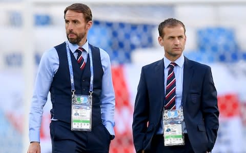 Gareth Southgate, Manager of England and Dan Ashworth, FA Director of Elite Development look on during a pitch inspection prior to the 2018 FIFA World Cup Russia group G match between England and Belgium at Kaliningrad Stadium on June 28, 2018 - Credit: Getty Images