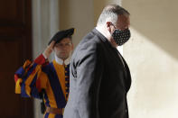 U.S. Secretary of State Mike Pompeo arrives at the San Damaso courtyard to meet Vatican Secretary of State Cardinal Pietro Parolin, at the Vatican, Thursday, Oct. 1, 2020. Pompeo is meeting Thursday with top Vatican officials, a day after tensions over U.S. opposition to the Vatican's China policy spilled out in public. (AP Photo/Andrew Medichini)