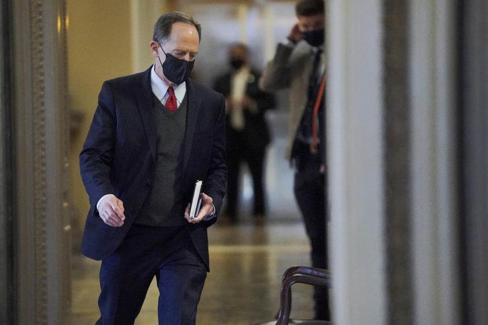 Sen. Pat Toomey, R-Pa., arrives at the start of the fifth day of the second impeachment trial of former President Trump, Saturday, Feb. 13, 2021 at the Capitol in Washington. (Greg Nash/Pool via AP)