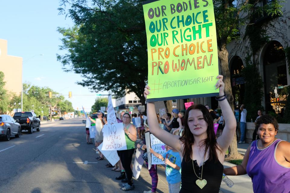 More than 60 pro-choice demonstrators protested Thursday evening outside and around U.S. Rep. Ronny Jackson's downtown Amarillo office to show their displeasure with the overturning of Roe vs. Wade by the Supreme Court and recent comments by the Republican Party.