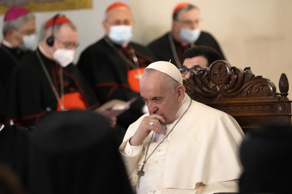 Pope Francis attends a ceremony at the Maronite Cathedral of Our Lady of Graces in Nicosia, Cyprus, Thursday, Dec. 2, 2021. Pope Francis' trip to Cyprus and Greece is drawing new attention to the plight of migrants on Europe's borders and the disconnect between Francis' Gospel-driven call for countries to welcome and integrate them and front-line governments that are increasingly unwilling or unable to let them in. (AP Photo/Alessandra Tarantino)