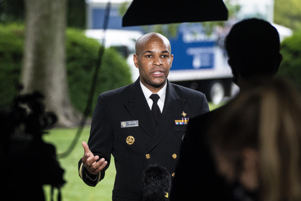 Surgeon General Jerome Adams during a TV interview at the White House on Tuesday. (Photo: The Washington Post via Getty Images)