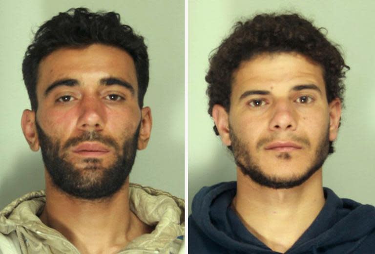 Mohammed Ali Malek (left) and Mahmud Bikhit were arrested on suspicion of people trafficking after they arrived in the Italian port city of Catania, on April 21, 2015