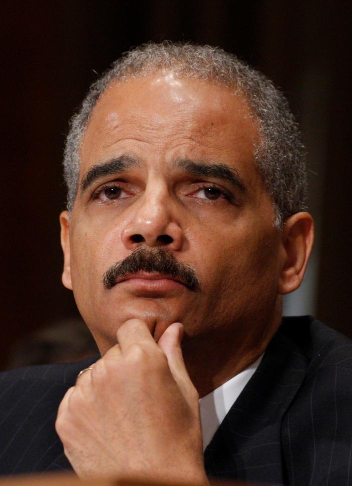Attorney General Eric Holder testifies June 25, 2009, on Capitol Hill in Washington before the Senate Judiciary Committee about whether to appoint a prosecutor to investigate the Bush administration's interrogation practices.