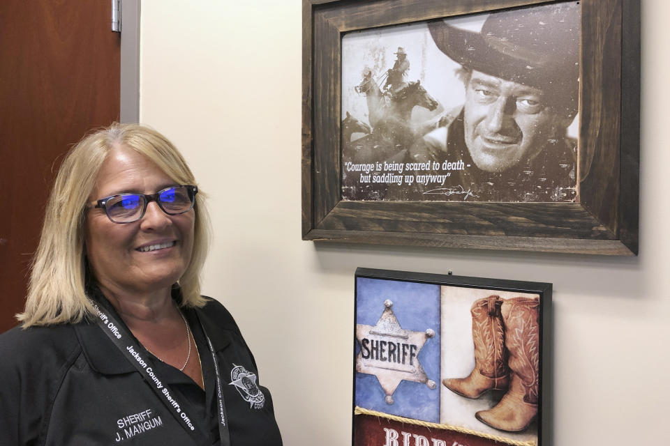 In this Sept. 12, 2019 photo, Jackson County Sheriff Janis Mangum is shown at her office, in Jefferson, Ga. A ransomware attack in March took down the office's computer system, forcing deputies to handwrite incident reports and arrest bookings. (AP Photo/Sudhin Thanawala)