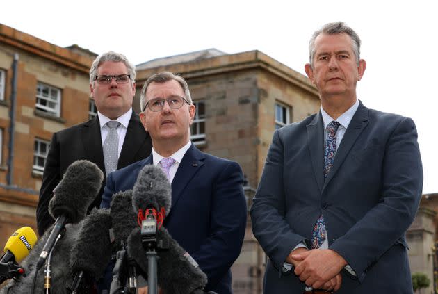 Sir Jeffrey Donaldson (centre), speaks to the media alongside Gavin Robinson (left), and Edwin Poots (right), after their meeting with Boris Johnson at Hillsborough Castle. (Photo: Liam McBurney via PA Wire/PA Images)