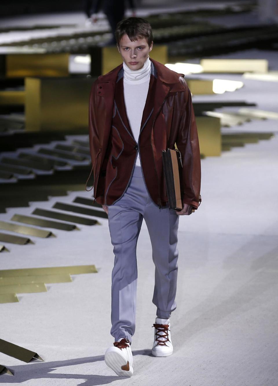 A model wears a creation for Ermenegildo Zegna men's Fall-Winter 2017-2018 collection, part of the Milan Fashion Week, unveiled in Milan, Italy, Friday, Jan. 13, 2017. (AP Photo/Antonio Calanni)