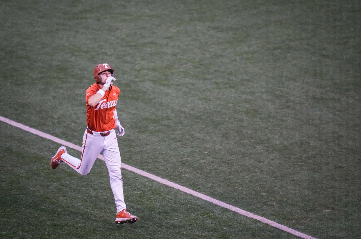 Texas' Jalin Flores celebrates as he heads toward the plate after hitting a home run against UT-Arlington on April 23. The Longhorns have hit 95 homers this season, seventh-most in the country, and are hoping to challenge the 2022 team's school record of 128.