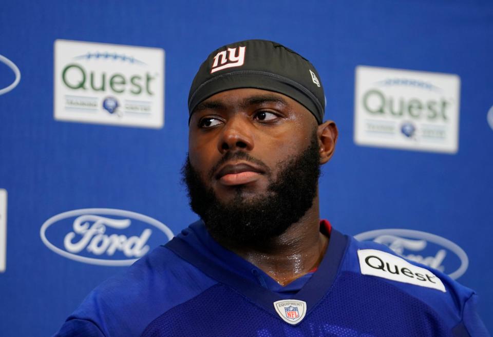 New York Giants offensive tackle Andrew Thomas (78) speaks to reporters after the first day of training camp in East Rutherford on Wednesday, July 26, 2023.