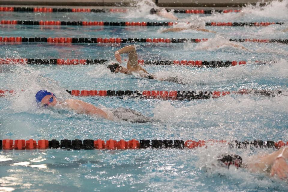 Annie Jia (lane 5) of Hatboro Horsham sprints through her 100 freestyle and finishes second with a time of 50.88 seconds. Swimmers competed at the 2022 District One swimming meet at York's Graham Aquatic Center on February 27, 2022.