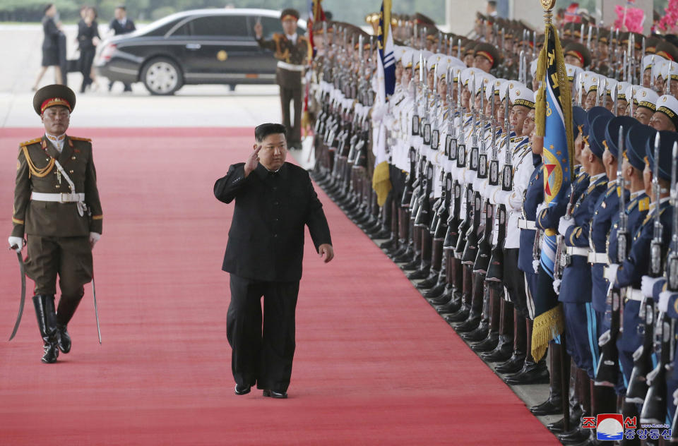 This Sunday, Sept. 10, 2023, photo provided by the North Korean government, shows that North Korea leader Kim Jong Un greets attendants in Pyongyang, North Korea, before boarding on a train to Russia. Independent journalists were not given access to cover the event depicted in this image distributed by the North Korean government. The content of this image is as provided and cannot be independently verified. Korean language watermark on image as provided by source reads: "KCNA" which is the abbreviation for Korean Central News Agency. (Korean Central News Agency/Korea News Service via AP)