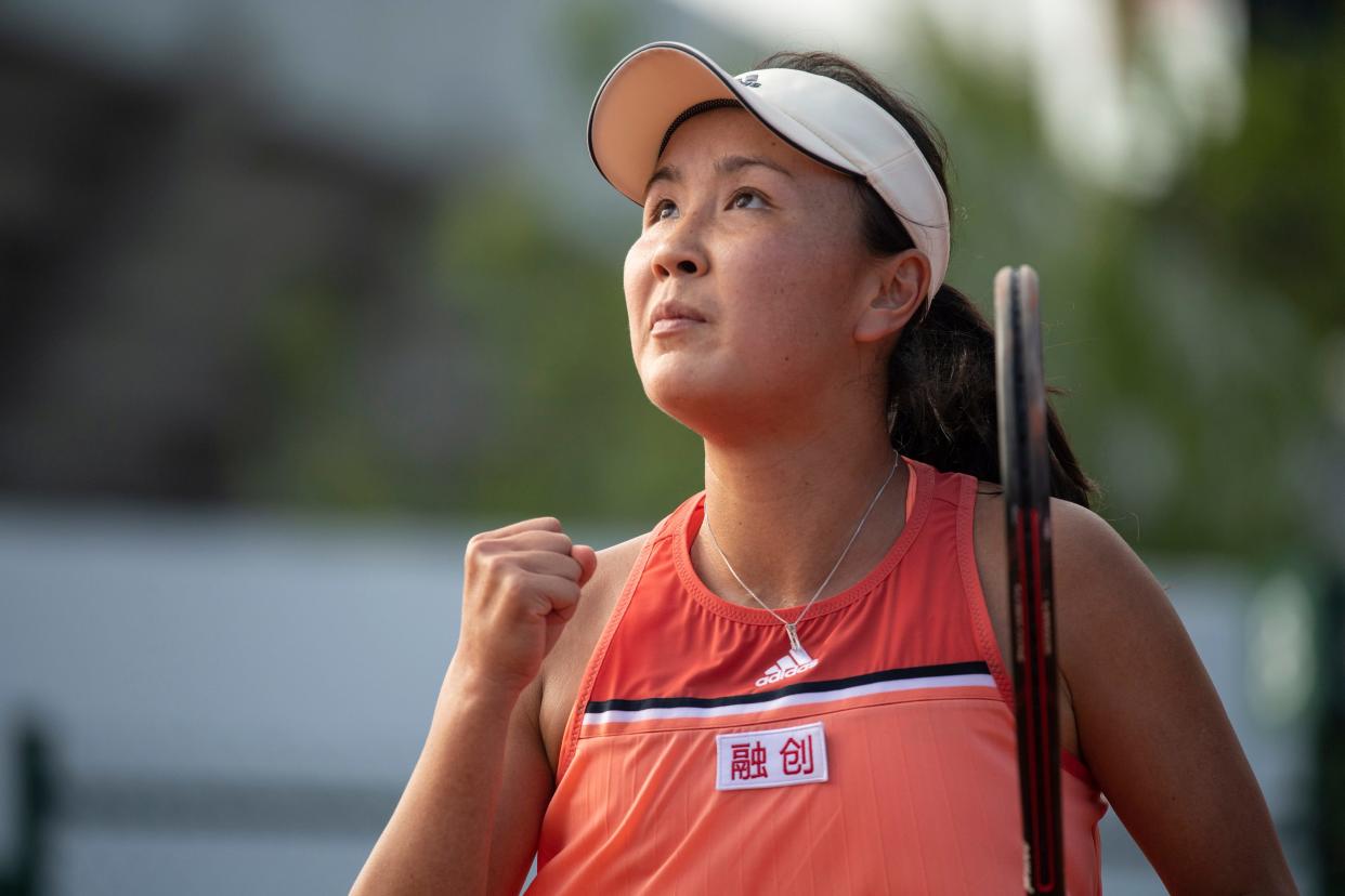 Peng Shuai reacts during a tennis match in 2018