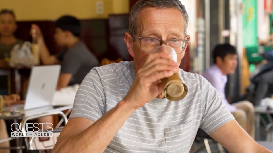 CNN's Richard Quest samples some of Ho Chi Minh City's famous weasel coffee. - CNN