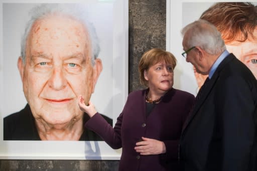 Merkel reaffirmed her government's commitment to fight anti-Semitism at the exhibition