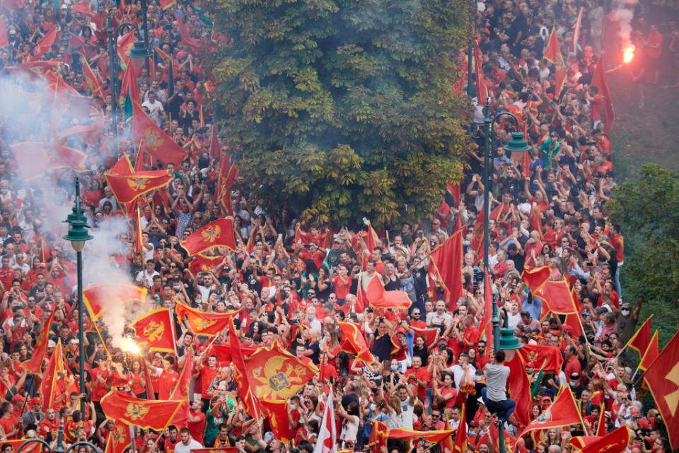 Thousands of Montenegrin nationalists loyal to President Milo Djukanovic gather in the royal city of Cetinje outside the Cetinje Monastery on September 3. Source: Getty