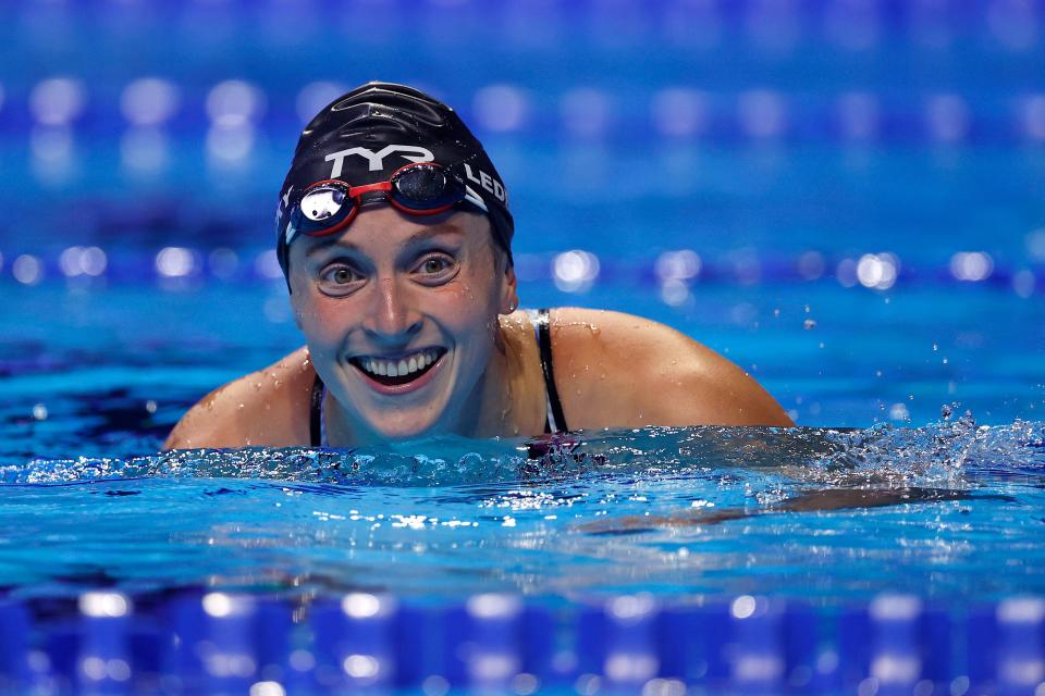 Katie Ledecky reacts after competing in the women’s 800-meter freestyle final at the 2021 U.S. Olympic Team Swimming Trials.