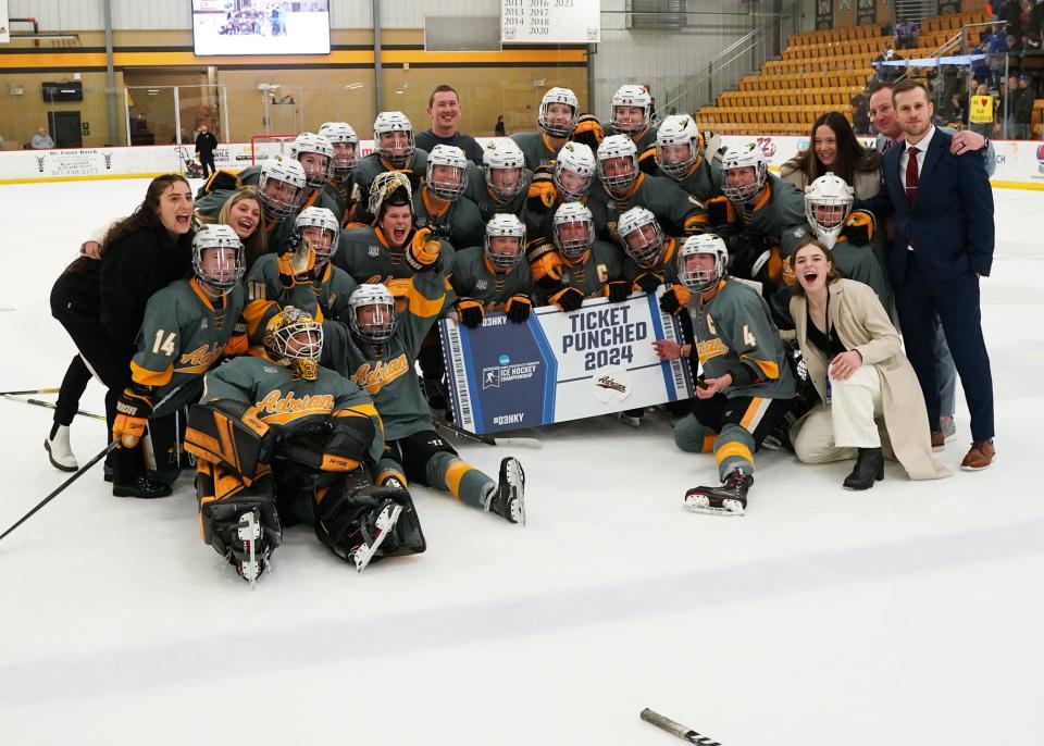 Adrian College women's hockey celebrates after earning a trip to the NCAA Division III Frozen Four.