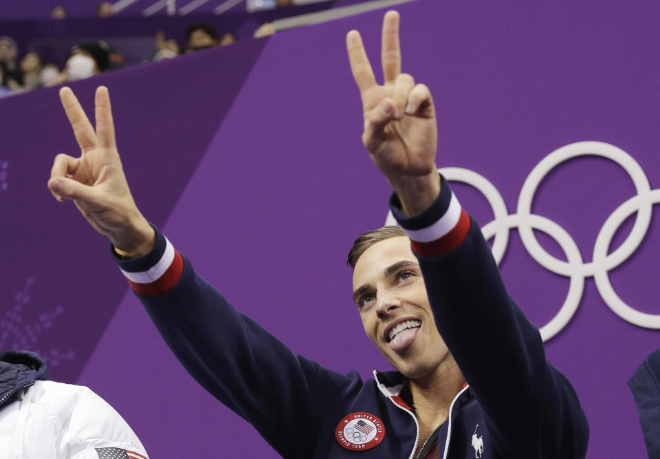 Adam Rippon of the United States reacts as his score is posted following his performance in the men’s short program figure skating. (AP)