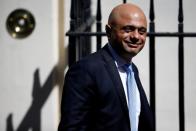 FILE PHOTO: Newly appointed Britain's Chancellor of the Exchequer Sajid Javid is seen outside Downing Street in London
