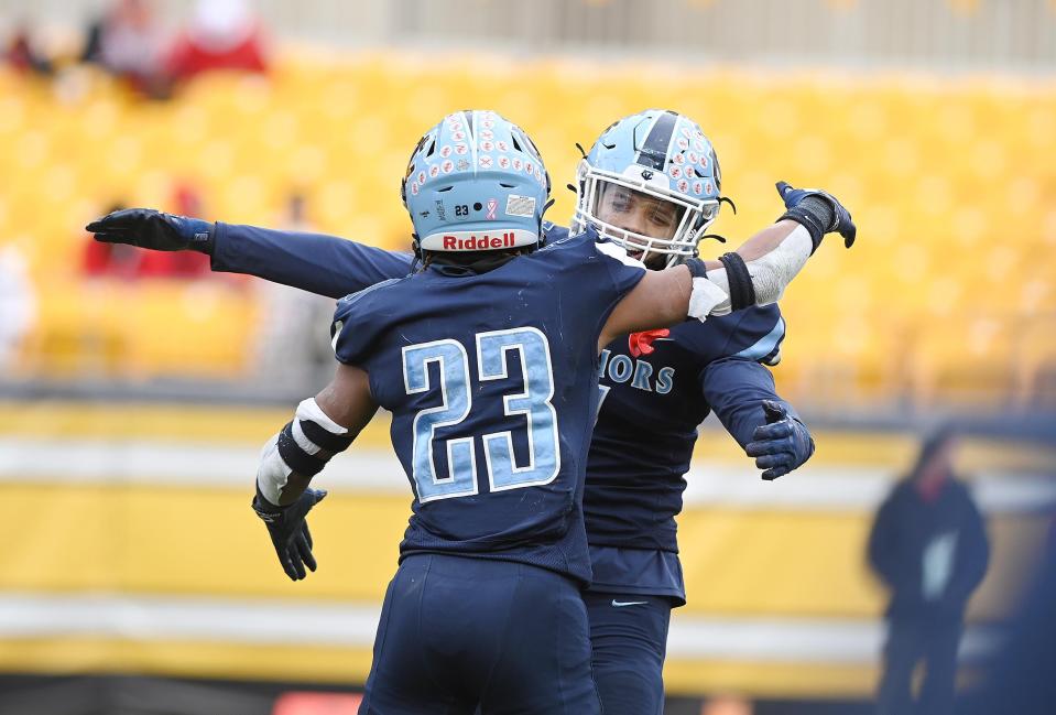 Central Valley's Landon Alexander congratulates Jayvin Thompson after Thompson scored a touchdown during the WPIAL Class 3A championship game, Saturday at Heinz Field.