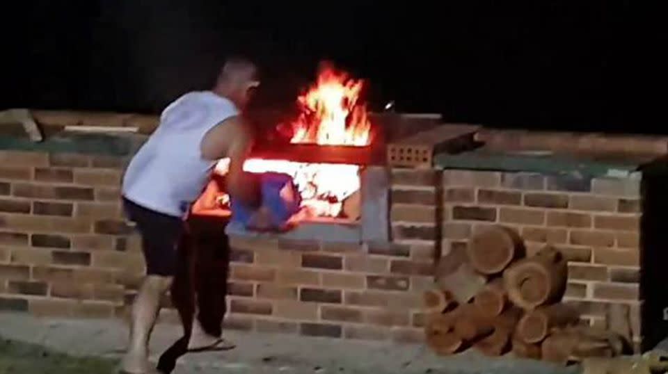 The man opted for a rather risky barbecue technique. Source: Jukin