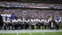 <p>Baltimore Ravens players, including former player Ray Lewis, second from right, kneel down during the playing of the U.S. national anthem before an NFL football game against the Jacksonville Jaguars at Wembley Stadium in London, Sunday Sept. 24, 2017. (AP Photo/Matt Dunham) </p>