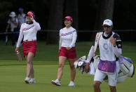 Jin Young Ko, of South Korea, left, and her teammate Sei Young Kim walk on the second fairway during the final round of the women's golf event at the 2020 Summer Olympics, Saturday, Aug. 7, 2021, at the Kasumigaseki Country Club in Kawagoe, Japan. (AP Photo/Andy Wong)