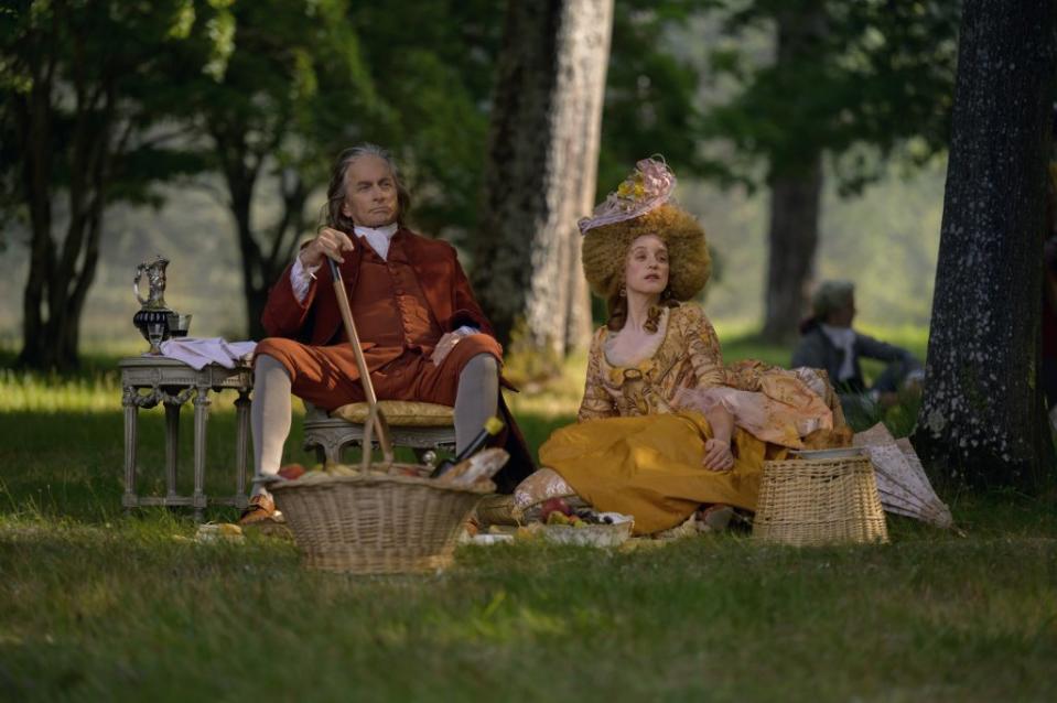 Michael Douglas and Ludivine Sagnier (Madame Anne-Louise Brillon) in a scene from “Franklin.” Courtesy of Apple