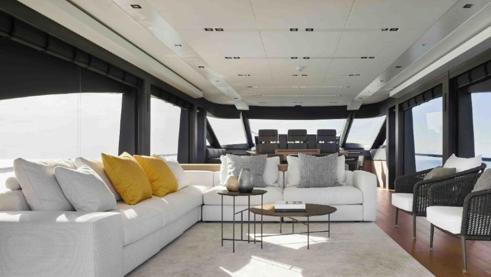 The interior has a contemporary open design, with large windows. - Credit: Courtesy AB Yachts