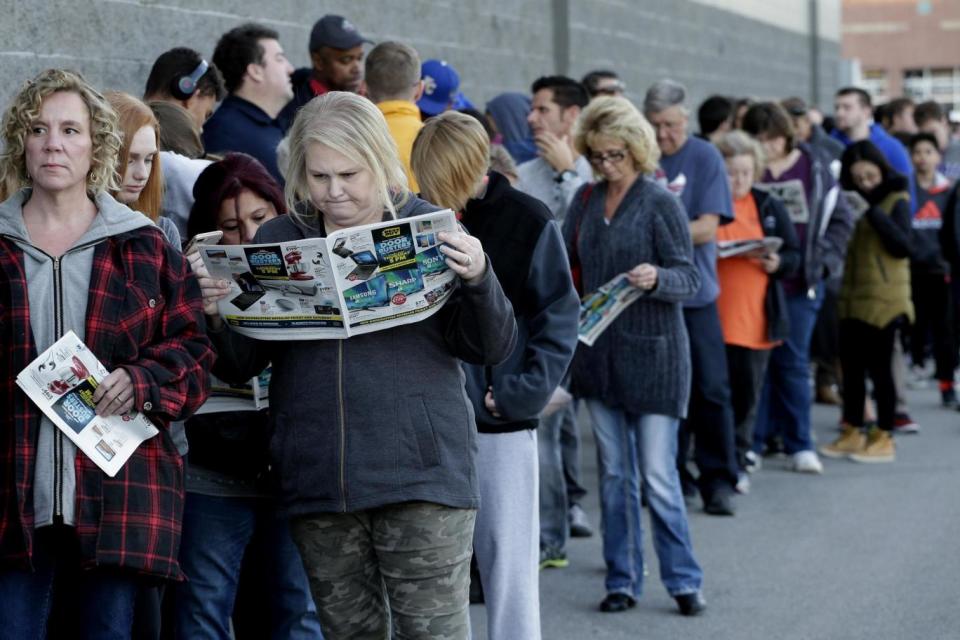 Shoppers went in line for a store to open in Kansas, US (AP)