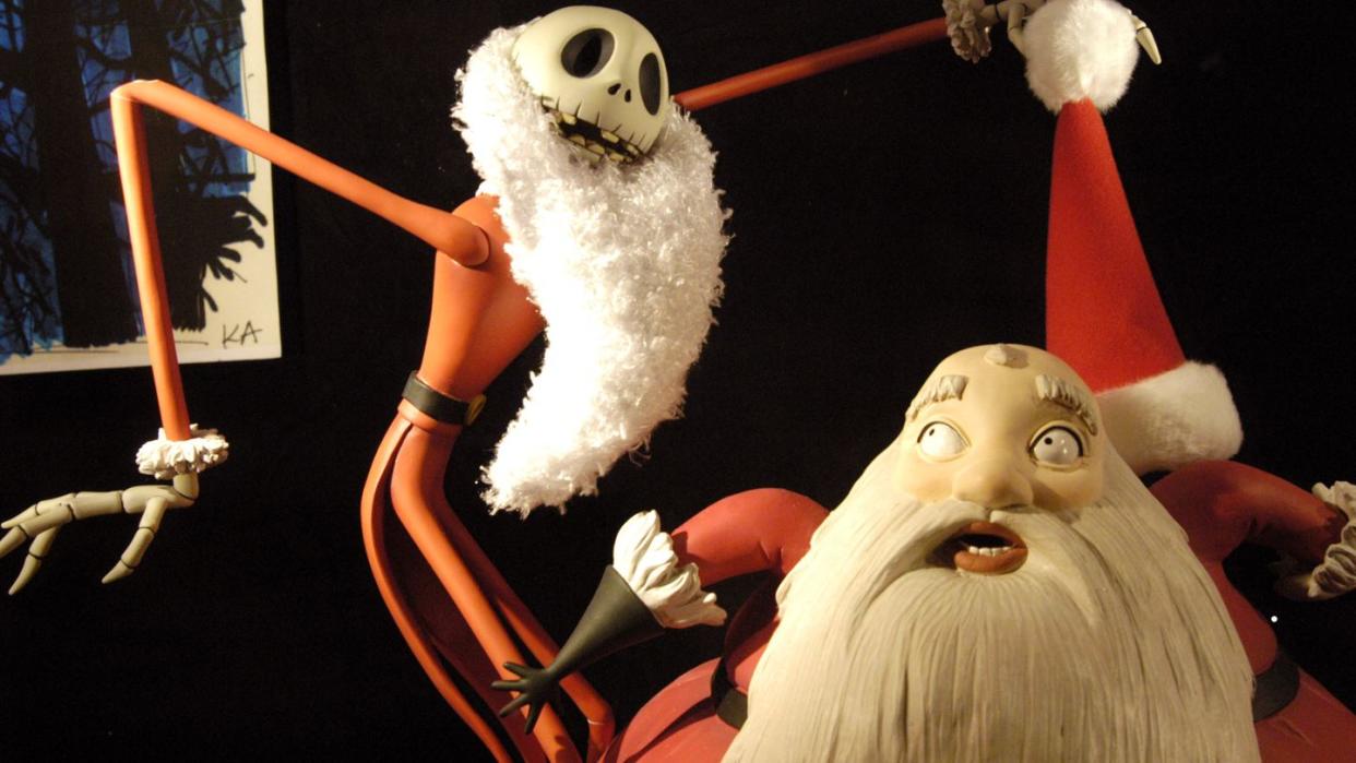 jack skellington removes santas hat in a scene from the nightmare before christmas a good housekeeping pick for best halloween movies