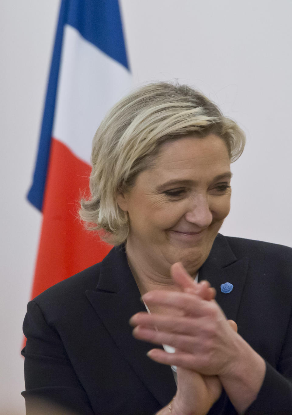 French far-right presidential candidate Marine Le Pen, applaudes after she delivers a speech in front of invited guests in Paris, Monday, March 13, 2017. The first French presidential ballot will take place on April 23 and the two top candidates go into a runoff on May 7. (AP Photo/Michel Euler)