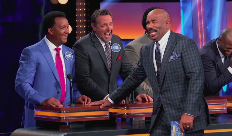 Steve Harvey reacts to an answer from Hall of Fame pitcher Pedro Martínez on <em>Celebrity Family Feud</em>. (Photo: Family Feud)