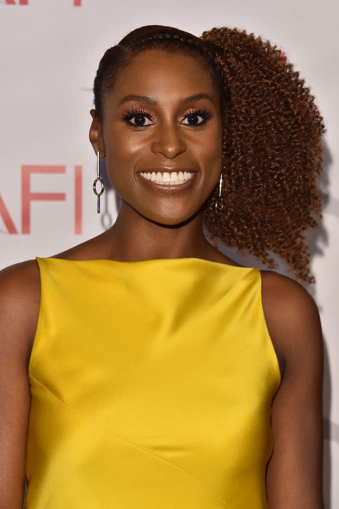 <p>Tight, full-bodied curls like <strong>Issa Rae</strong>'s make for an incredible side ponytail. To keep the top slicked down, apply a strong gel.</p><p><a class="link " href="https://go.redirectingat.com?id=74968X1596630&url=https%3A%2F%2Fwww.dermstore.com%2Fproduct_Curl%2BCharisma%2BRice%2BAmino%2BQuinoa%2BFrizz%2BControl%2BGel_66672.htm&sref=https%3A%2F%2Fwww.harpersbazaar.com%2Fbeauty%2Fg40464800%2Fcelebrity-hairstyles-ponytail%2F" rel="nofollow noopener" target="_blank" data-ylk="slk:SHOP HAIR GEL">SHOP HAIR GEL</a></p>