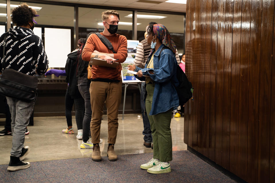 Image: Yes 4 Minneapolis canvassers stand outside North High School auditorium in Minneapolis on Oct. 12, 2021. (Drew Arrieta for NBC News)