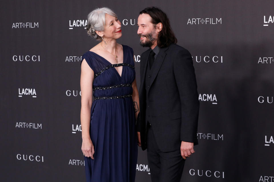 A photo of Alexandra Grant and Keanu Reeves on the red carpet at the 2019 LACMA Art + Film Gala at LACMA on November 02, 2019 in Los Angeles, California.