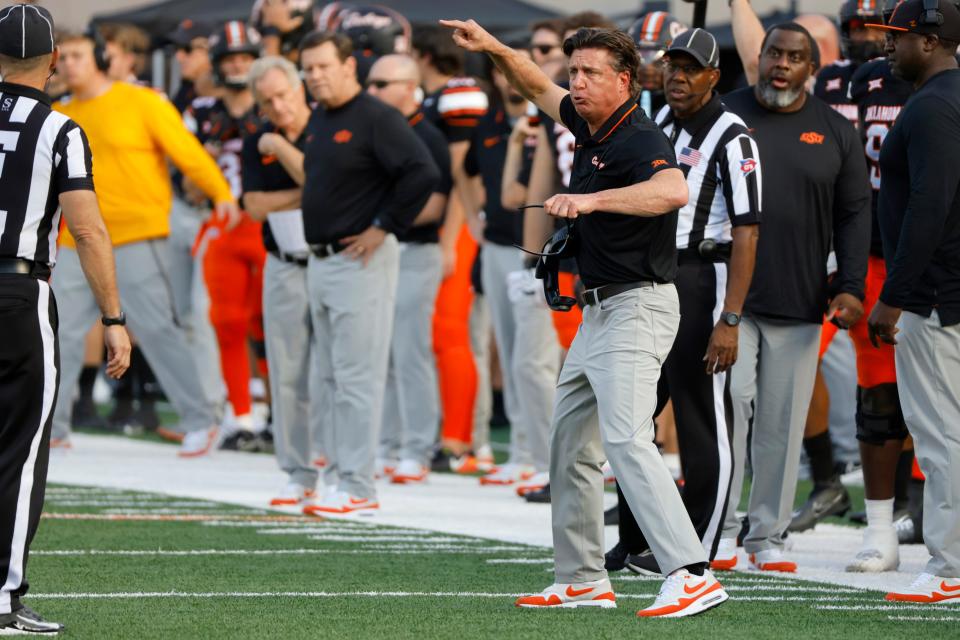 Oklahoma State coach Mike Gundy shouts at an official during a Bedlam college football game between the Oklahoma State University Cowboys (OSU) and the University of Oklahoma Sooners (OU) at Boone Pickens Stadium in Stillwater, Okla., Saturday, Nov. 4, 2023. Oklahoma State won 27-24.