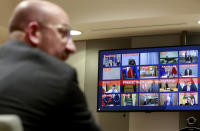 European Council President Charles Michel, left, participates in a videoconference call with EU leaders at the European Council building in Brussels, Tuesday, March 10, 2020. EU leaders held a videoconference Tuesday to coordinate efforts across the 27-nation bloc in the hopes of slowing down the spread of the coronavirus. For most people, the new coronavirus causes only mild or moderate symptoms, such as fever and cough. For some, especially older adults and people with existing health problems, it can cause more severe illness, including pneumonia. (Stephanie Lecocq, Pool Photo via AP)