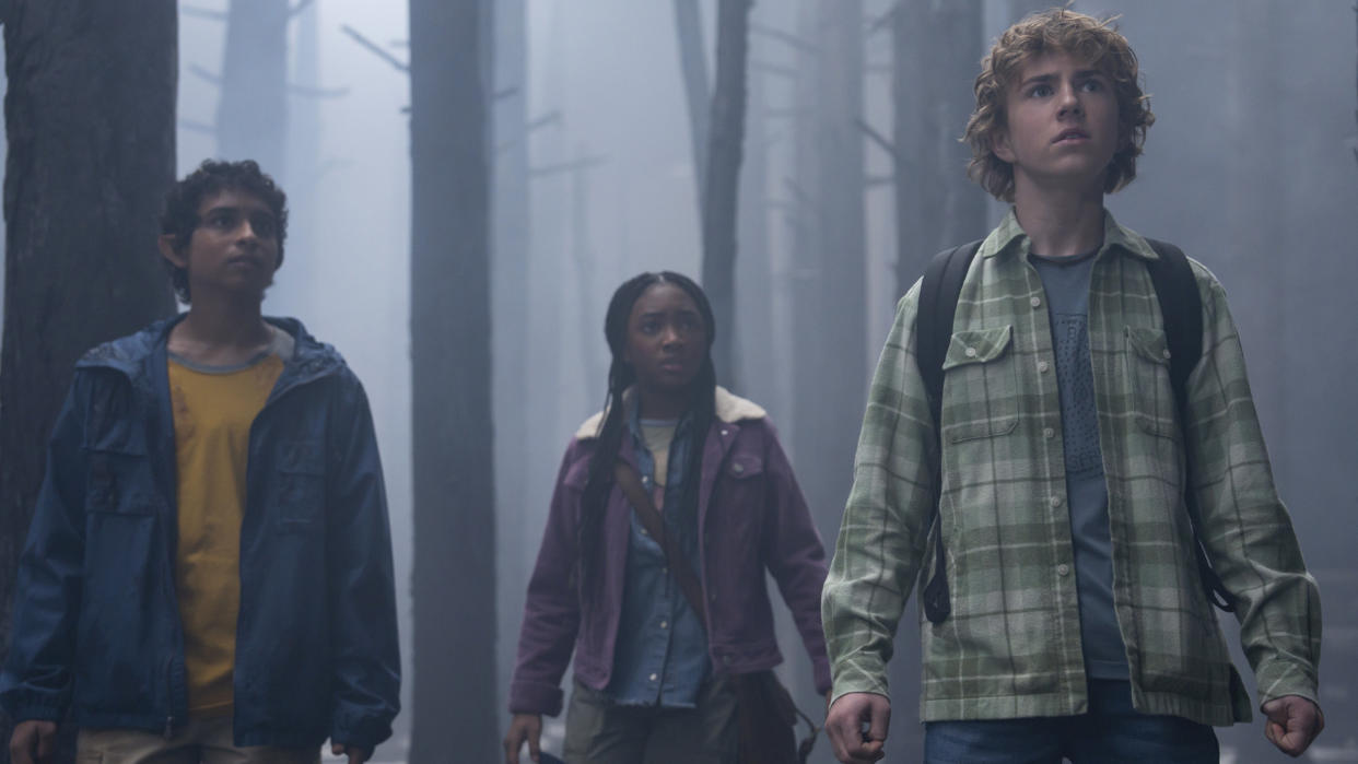  Grover, Annabeth, and Percy stand in a foggy forest in Percy Jackson and the Olympians' TV series. 