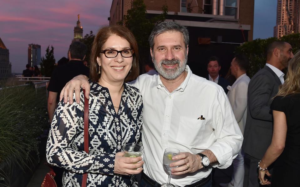 Chris and Neda Morvillo attend a cocktail party in New York