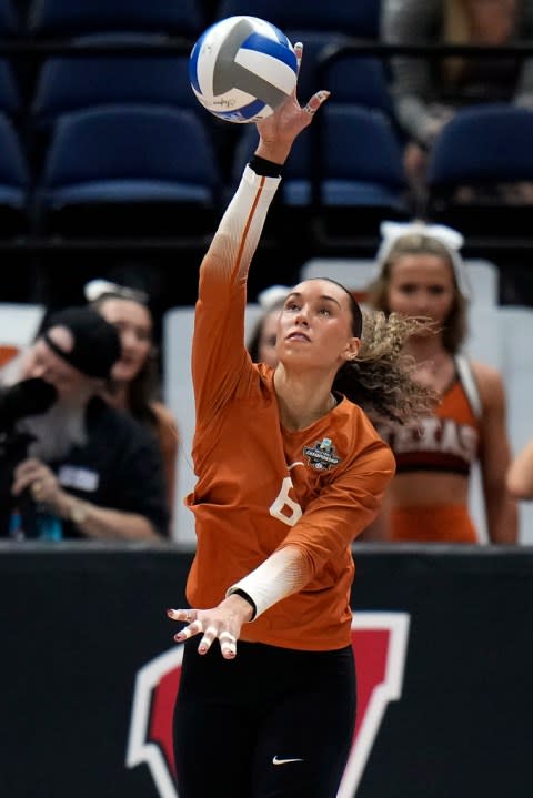 Texas’s Madisen Skinner (6) serves to Nebraska during the championship match in the NCAA Division I women’s college volleyball tournament Sunday, Dec. 17, 2023, in Tampa, Fla. (AP Photo/Chris O’Meara)