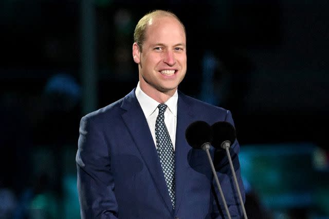 <p> LEON NEAL/POOL/AFP via Getty</p> Prince William speaks on stage at the Coronation Concert in May 2023.