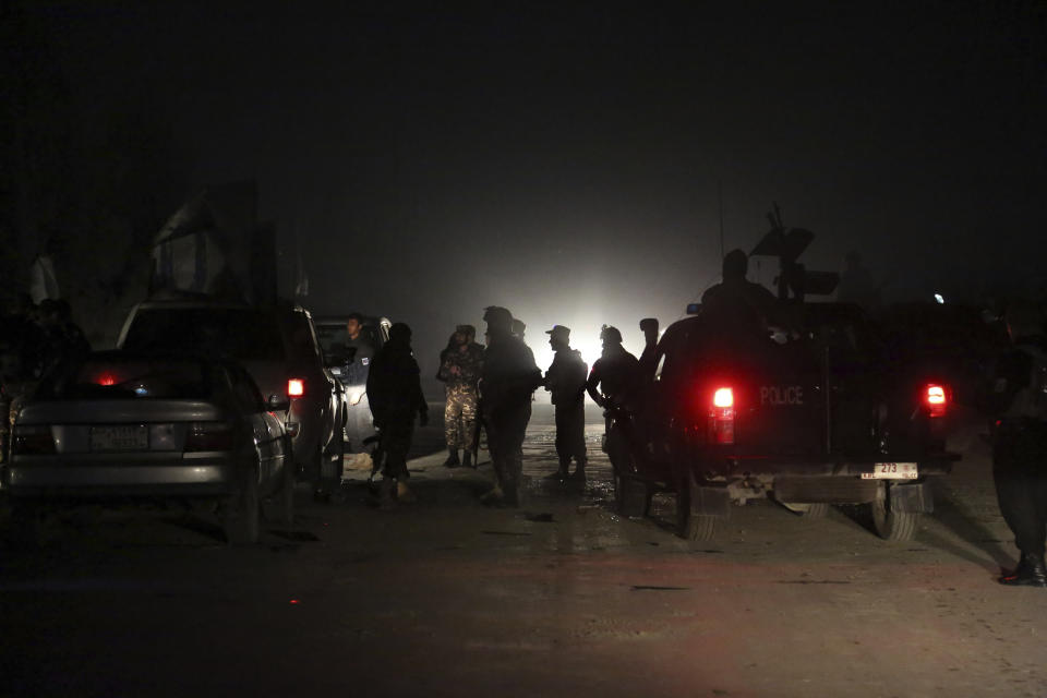 Afghan security personnel arrive at the site of explosion in Kabul, Afghanistan, Sunday, Nov. 24, 2019. An Afghan official said the blast in that capital Kabul targeting a United Nations vehicle has left at least 1 dead. Nasrat Rahimi, spokesman for the Interior Ministry, said several others were wounded in the attack. (AP Photo/Rahmat Gul)