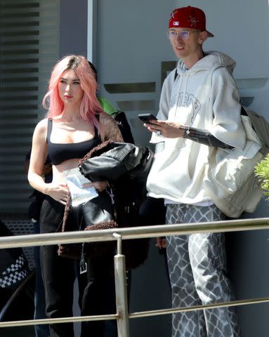 <p>Clasos.com.mx / SplashNews</p> Megan Fox and Machine Gun Kelly were pictured arriving in Mexico on Monday