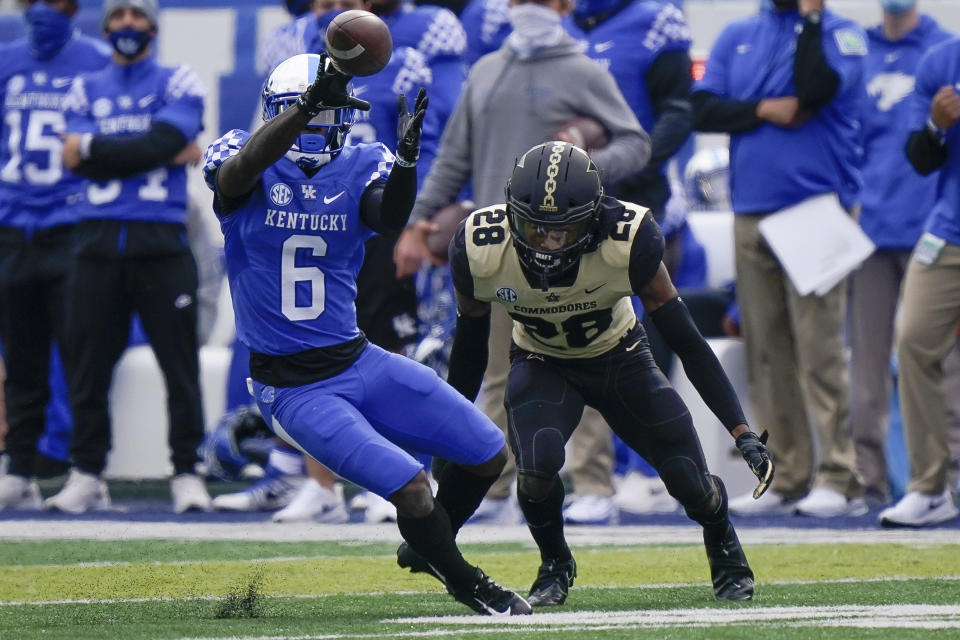 Kentucky wide receiver Josh Ali (6) catches a pass during the first half of an NCAA college football game against Vanderbilt, Saturday, Nov. 14, 2020, in Lexington, Ky. (AP Photo/Bryan Woolston)