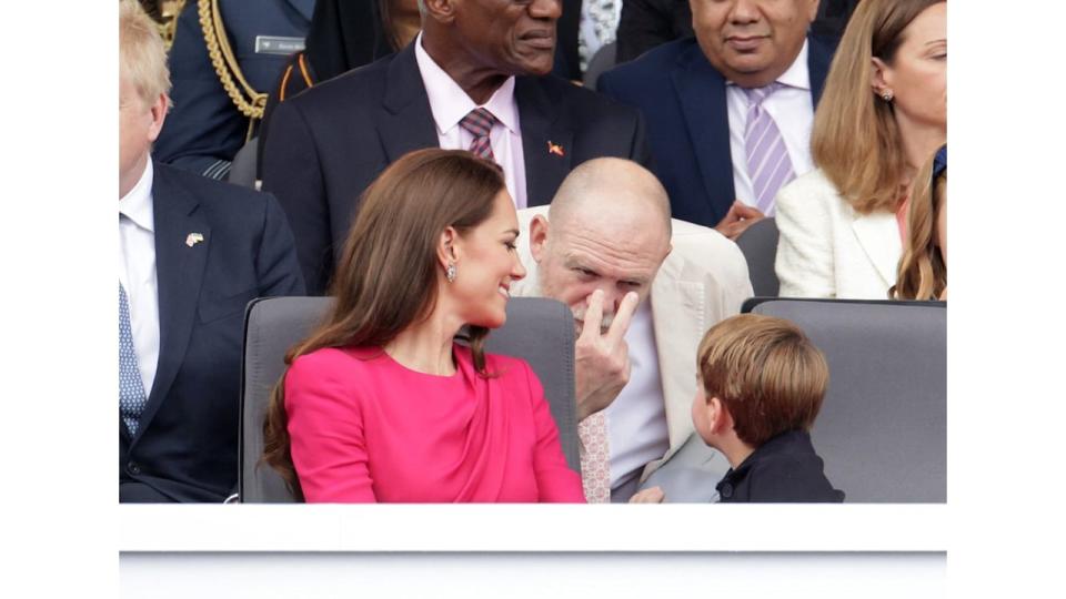 Mike Tindall making an 'I'm watching you' gesture to Prince Louis