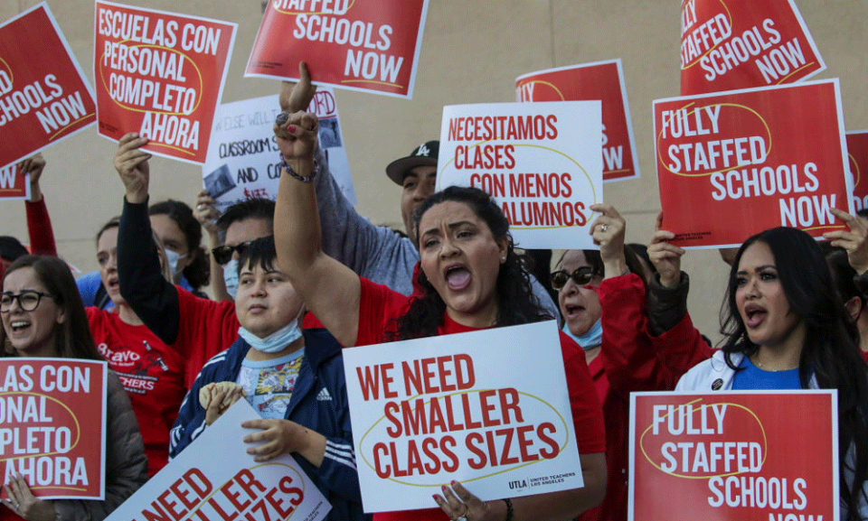 Rocio Rivas, center, a member of the Los Angeles Board of Education, demonstrated with United Teachers Los Angeles in October over contract demands. (Irfan Khan/Los Angeles Times/Getty Images)